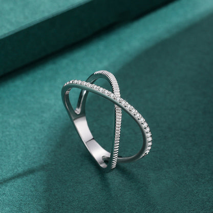 Crossed Sparkling Clear CZ Ring